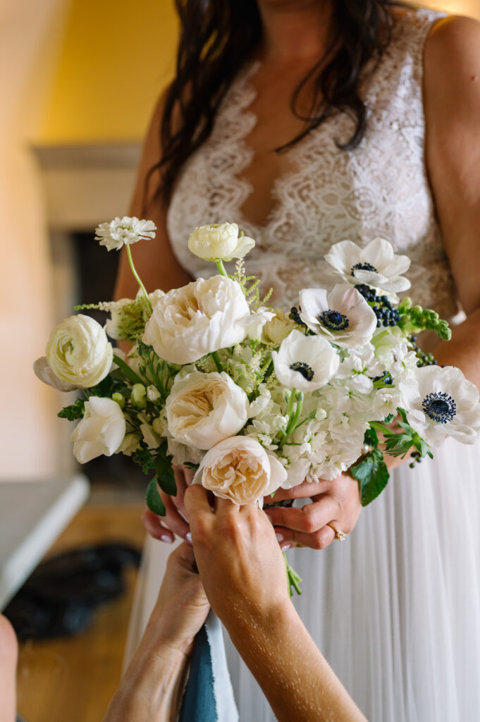 white, peach, and buttery yellow bridal bouquet by bird and bumble in Milwaukee Wisconsin